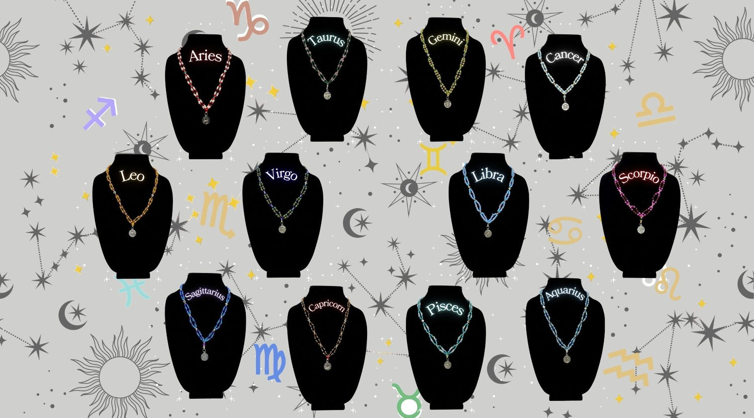 Homepage showcase of the Zodiac Necklace Collection by Gitana Mystical Products — handmade beaded necklaces with pendants for all 12 zodiac signs, displayed on a gray constellation background.
